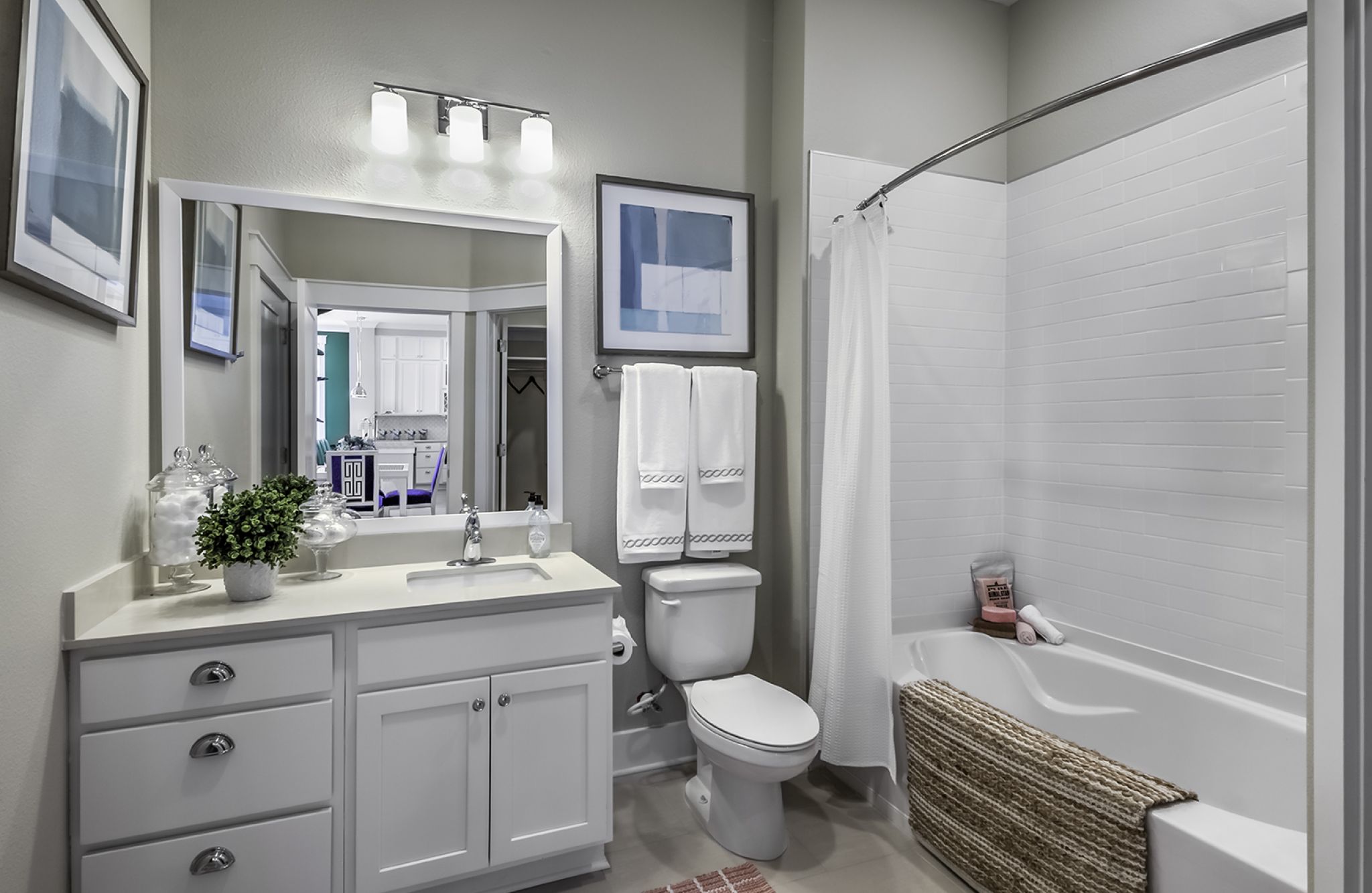 Solstice apartment with large open-space concept floor plan with large living room furnished with couch, coffee tale and chairs
