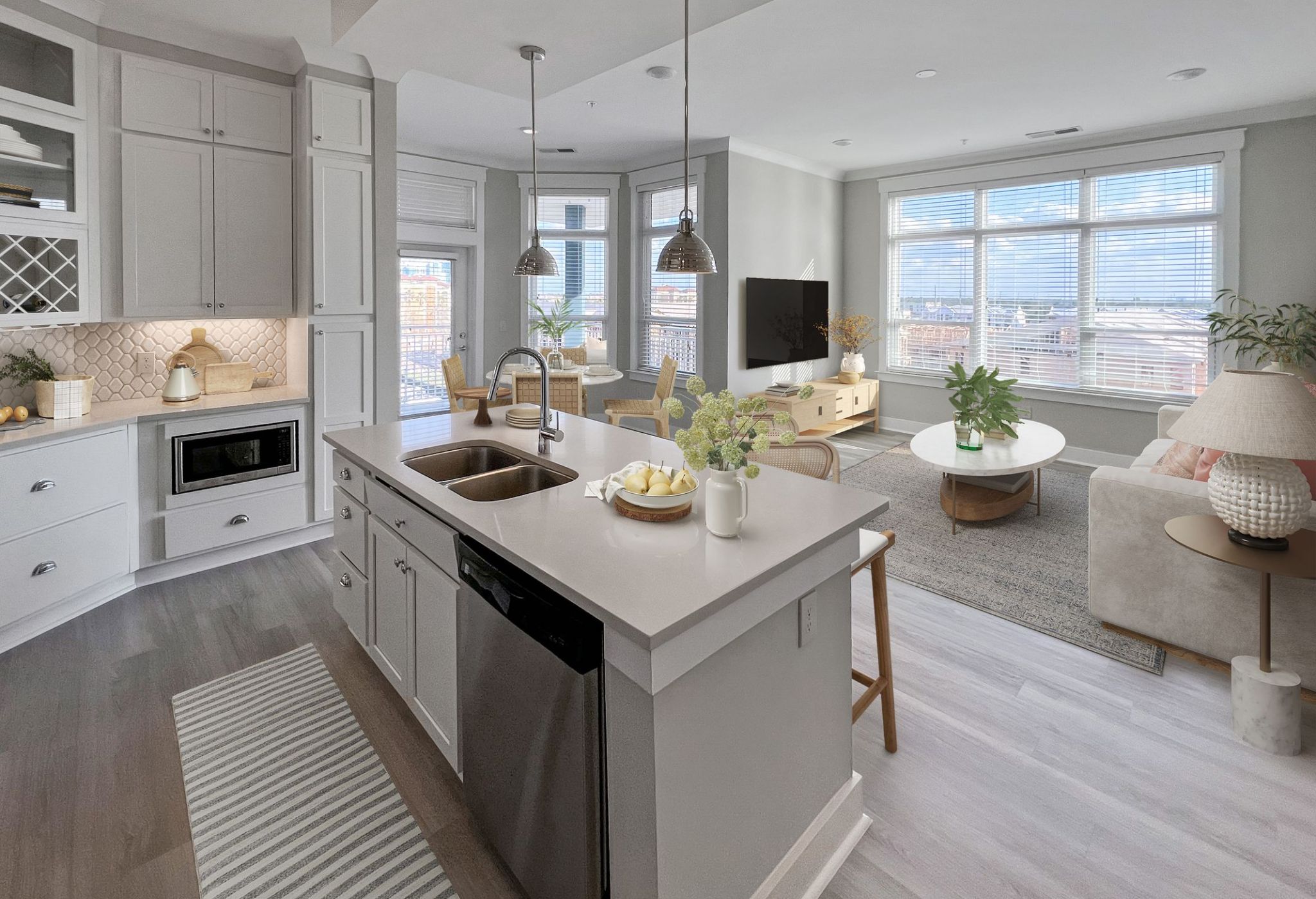 Luxury apartment kitchen with stainless steel appliances, granite countertops, and lots of storage space
