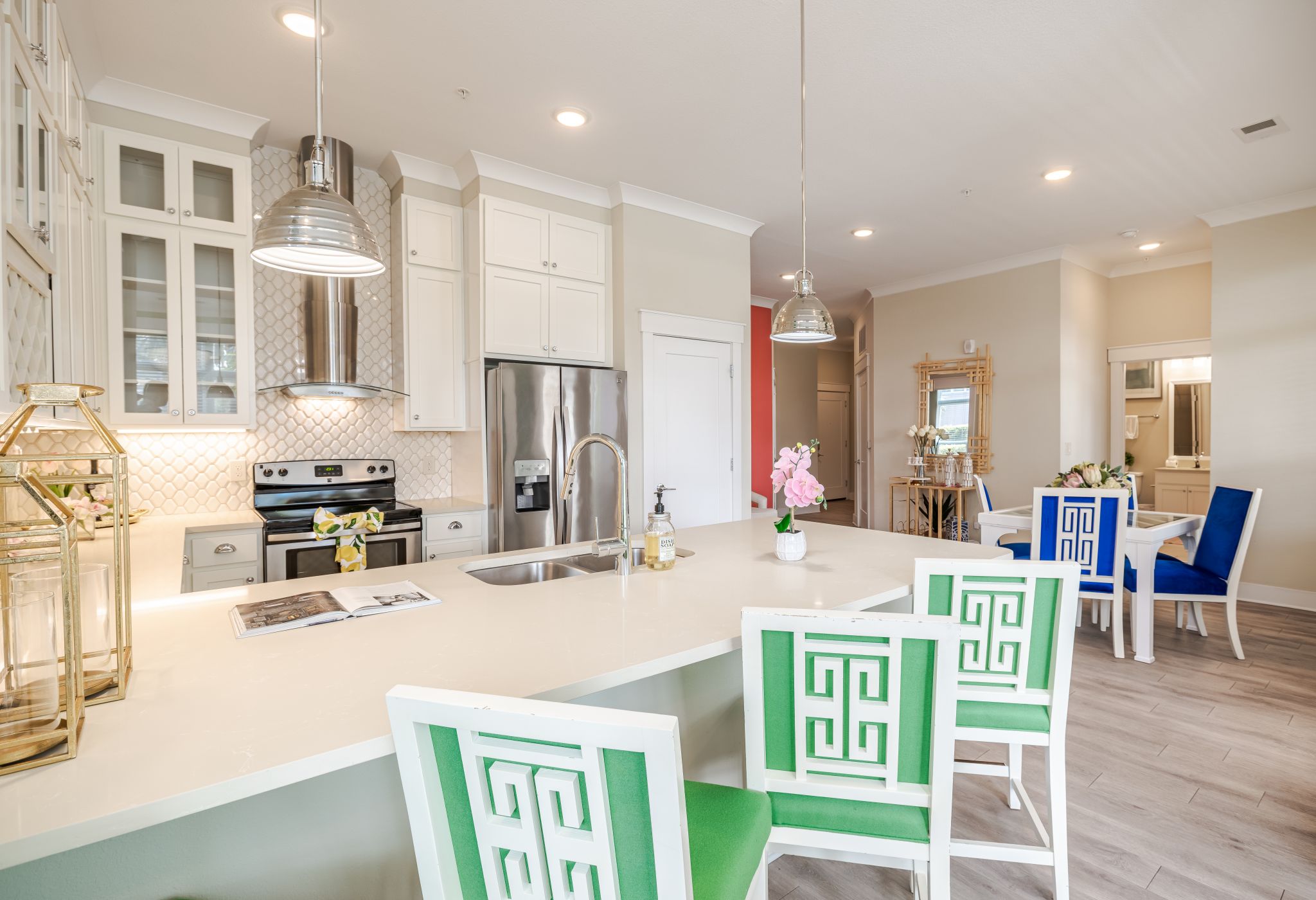 Luxury apartment kitchen with stainless steel appliances, granite countertops, and lots of storage space
