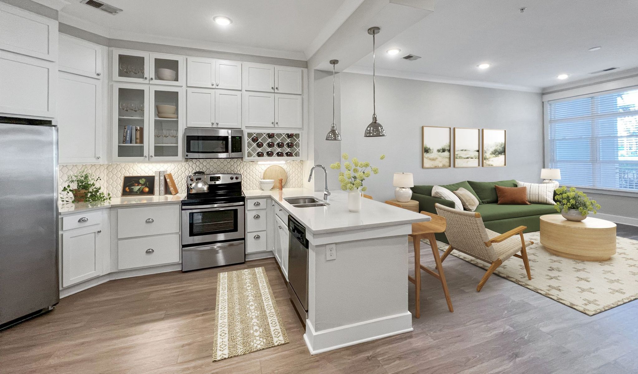 Solstice apartments open floor plan featuring luxury kitchen with quartz countertops and stainless steel appliances